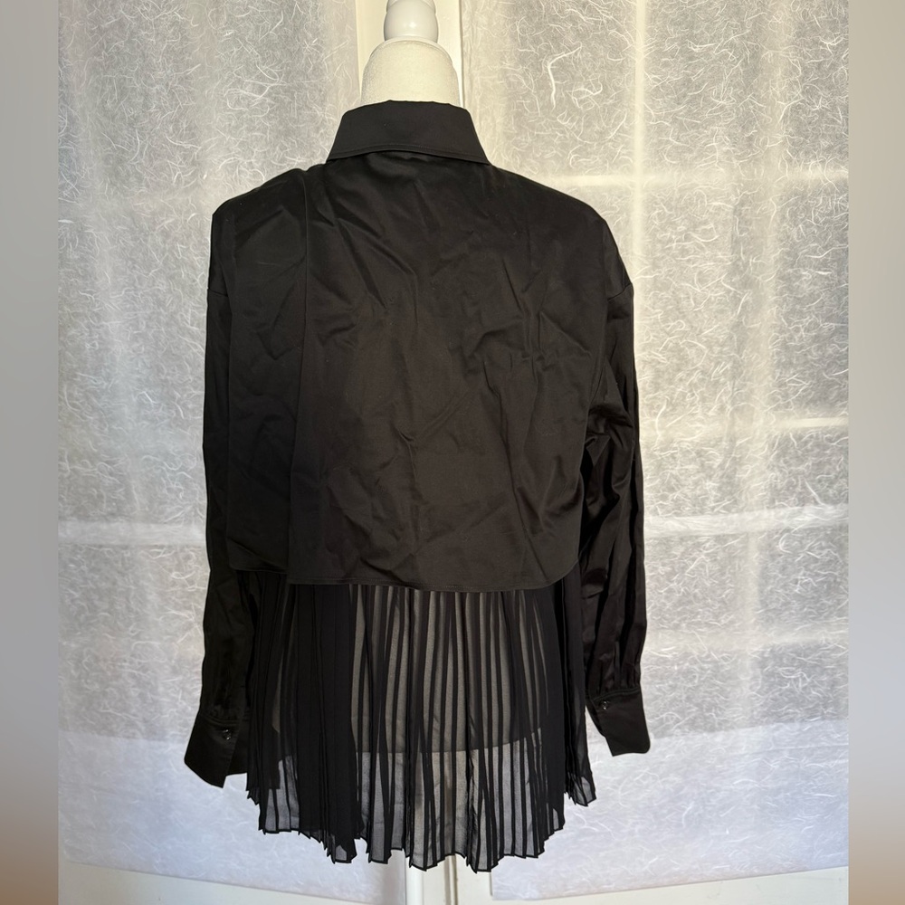 ADEAM Top with Unique Button Accent and back flare